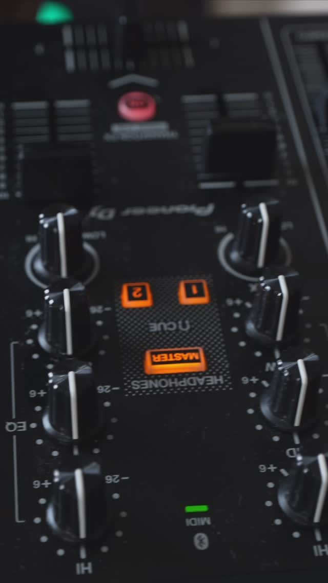 Close-up of DJ controls used by DJ Kadero while preparing a set